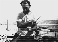 Uomini reti e barche attorno a Montecristo